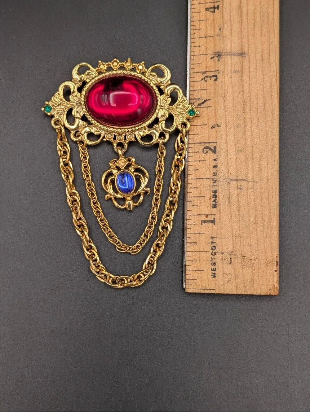 Vintage 1980s Regal Brooch Ruby Red Blue Glass Cabochon Draped Chain Pin